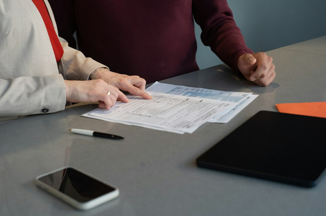 entrepreneur signing documents