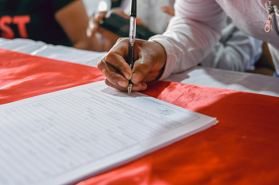 entrepreneur signing legal documents