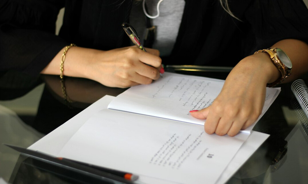 entrepreneur signing legal documents